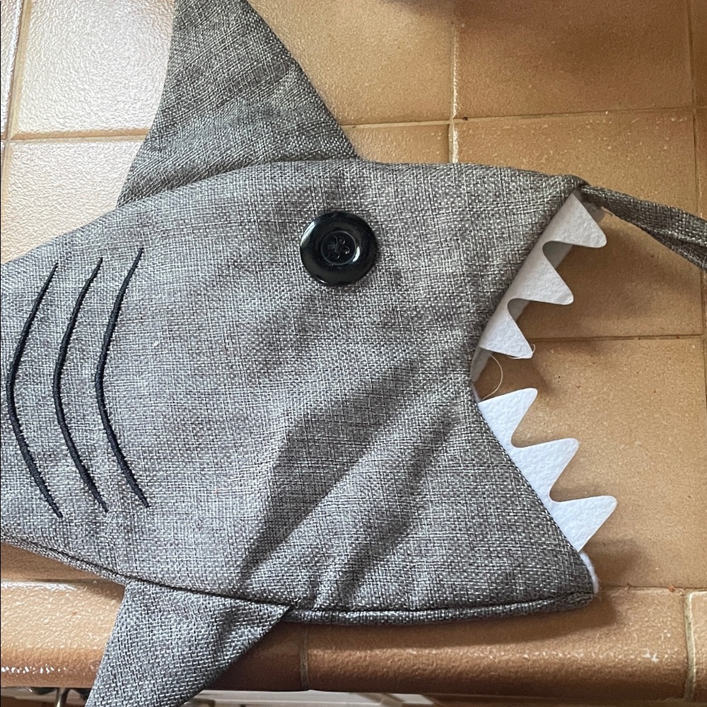Gray Shark-Shaped stocking. Has hoop for hanging.